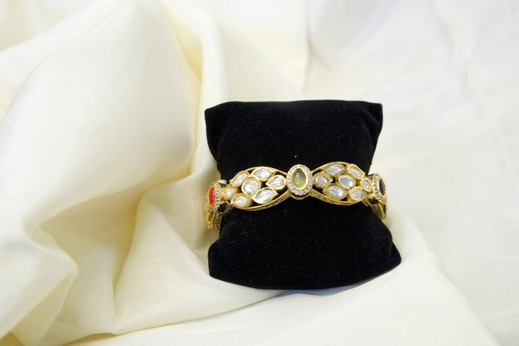 Elegant Gold-Toned Kundan Bangle with Pearl Accents