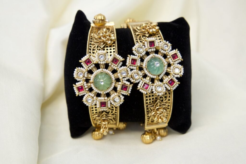 Traditional Gold-Plated Kada Bangles with Green Stone and Ruby Accents