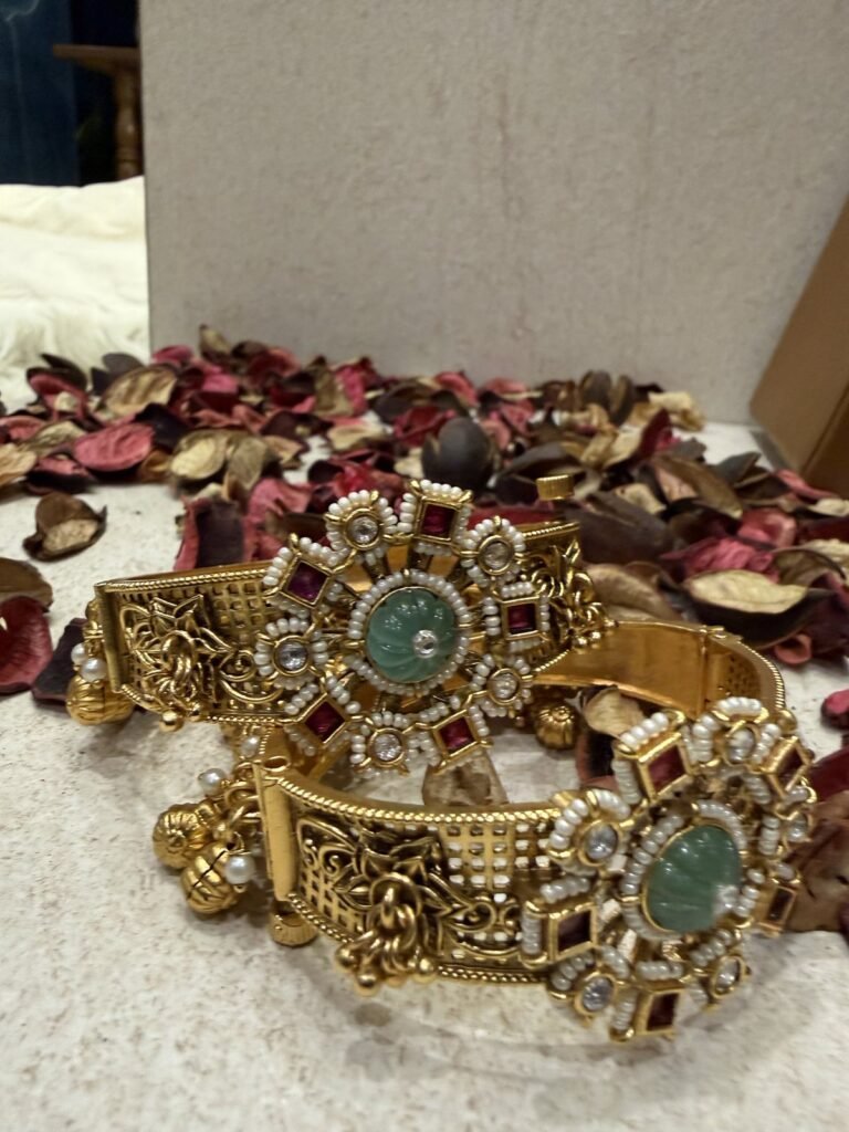 Traditional Gold-Plated Bangles with Green Stone and Pearl Embellishments