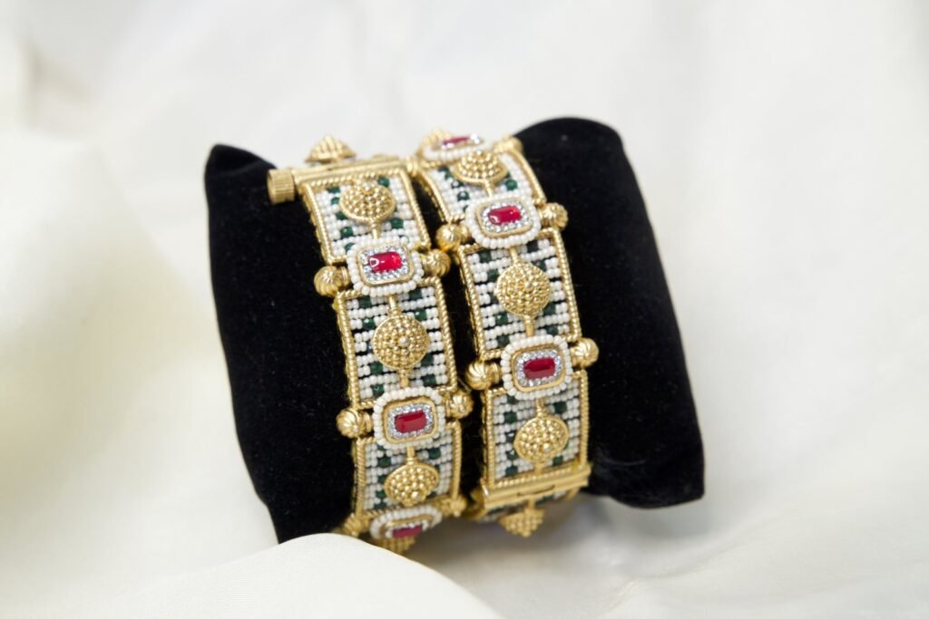 Traditional Gold-Plated Kundan Bangles with Ruby and Emerald Accents (Set of 2)