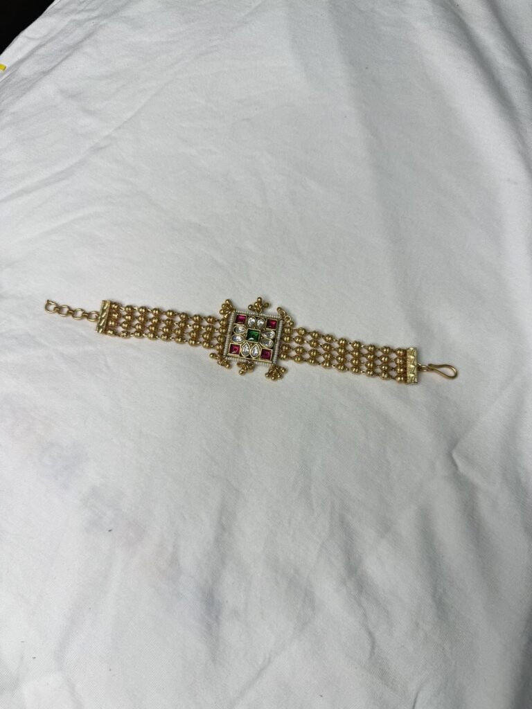 Traditional Gold-Plated Pearl Bracelet with Kundan Centerpiece