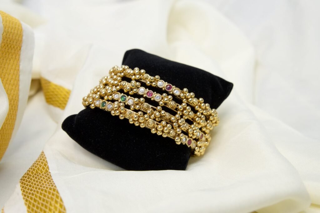 Golden Stone-Studded Bangle Set with Colorful Accents