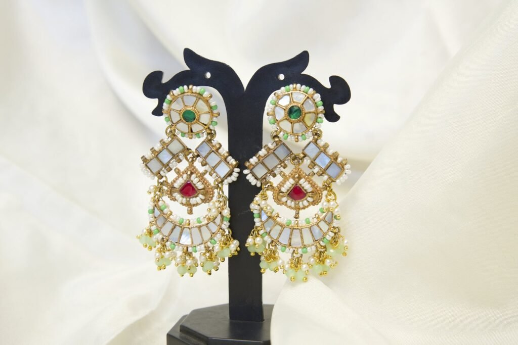 Elegant Kundan and Jadau Chandbali Earrings with Turquoise, Ruby, and Pearl Accents