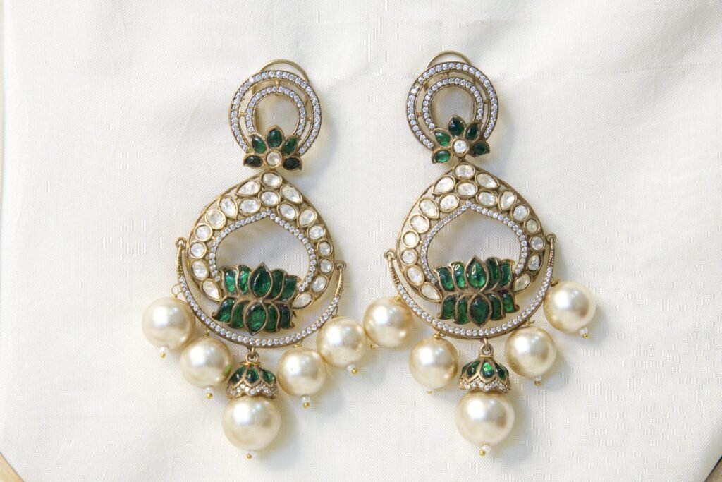Elegant Pearl Drop Earrings with Green Lotus Design and Kundan Work