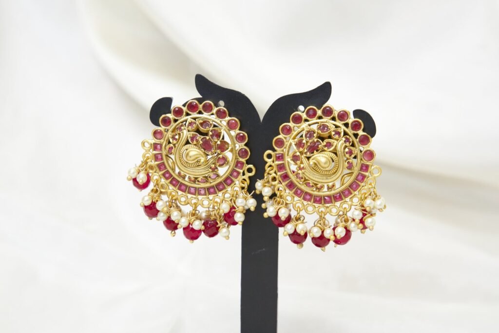 Traditional Gold-Toned Chandbali Earrings with Red Stones and Pearl Drops