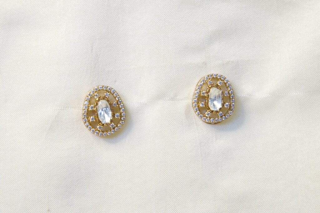 Elegant Gold-Toned Oval Crystal Stud Earrings