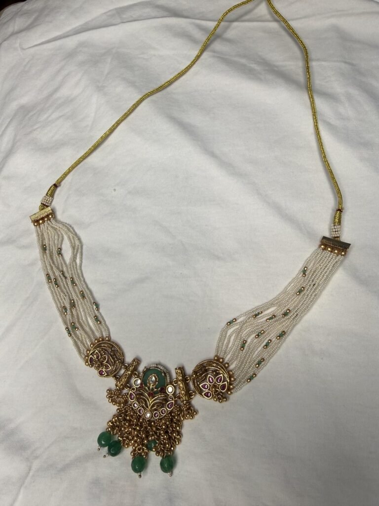 Traditional Gold-Toned Peacock Necklace Set with Green Beads and Matching Earrings