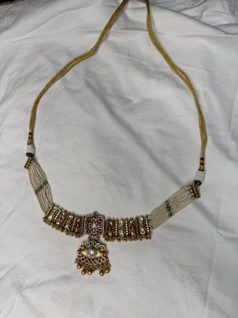 Traditional Gold-Toned Kundan Necklace Set with Matching Jhumka Earrings