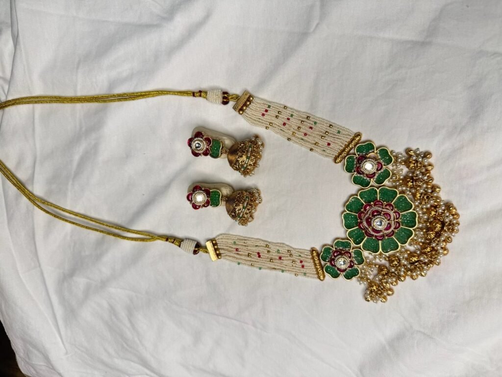 Traditional Green Kundan Necklace Set with Gold Beaded Tassels and Matching Jhumka Earrings