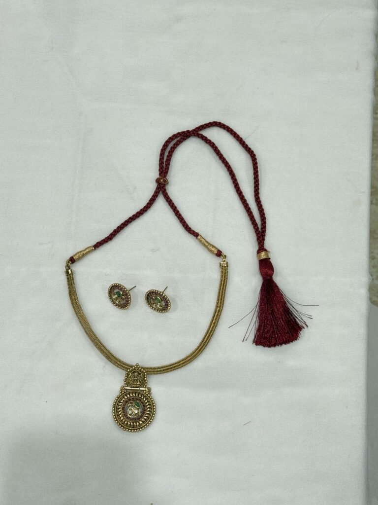 Traditional Gold-Toned Kundan Jewelry Set with Maroon Beaded Dori
