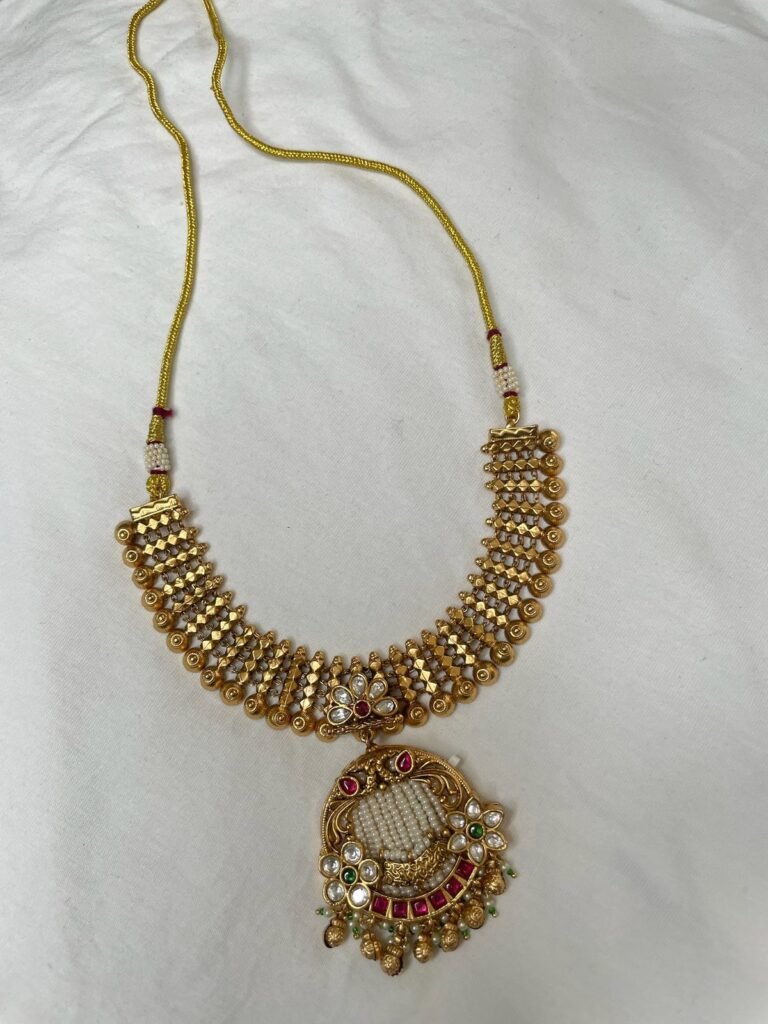 Traditional Gold-Toned Temple Jewellery Necklace Set with Jhumka Earrings