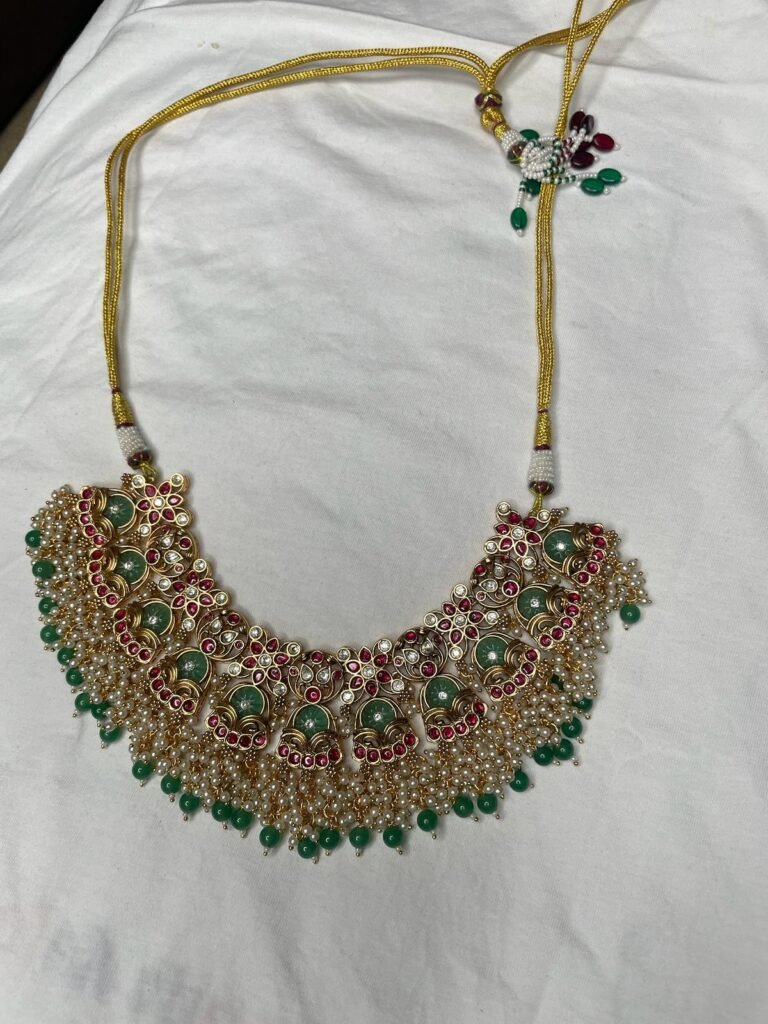 Traditional Kundan Necklace Set with Green and Red Stones