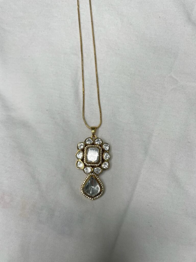 Gold-Toned Crystal Studded Pendant Necklace and Earrings Set