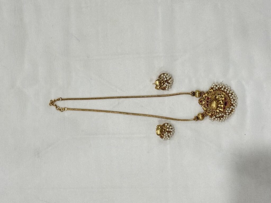 Gold-Toned Pearl-Studded Pendant Necklace with Matching Earrings