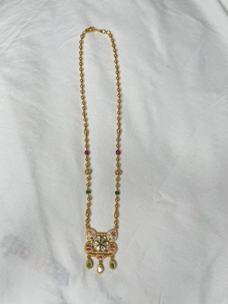 Traditional Gold-Toned Necklace Set with Colorful Gemstones and Matching Earrings