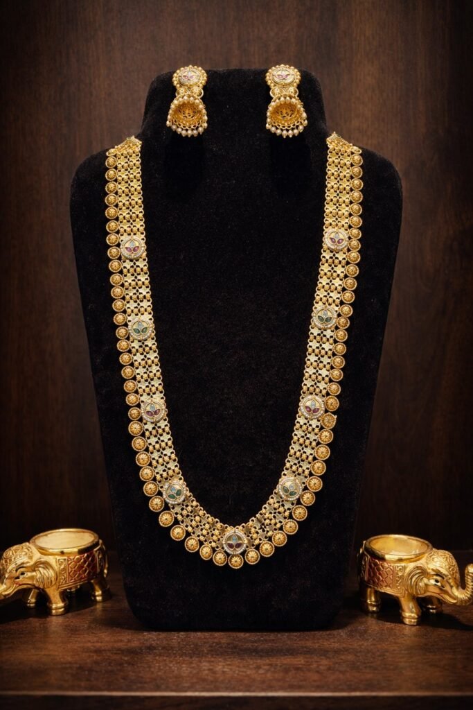 Traditional Gold-Toned Temple Coin Long Necklace Set with Jhumka Earrings