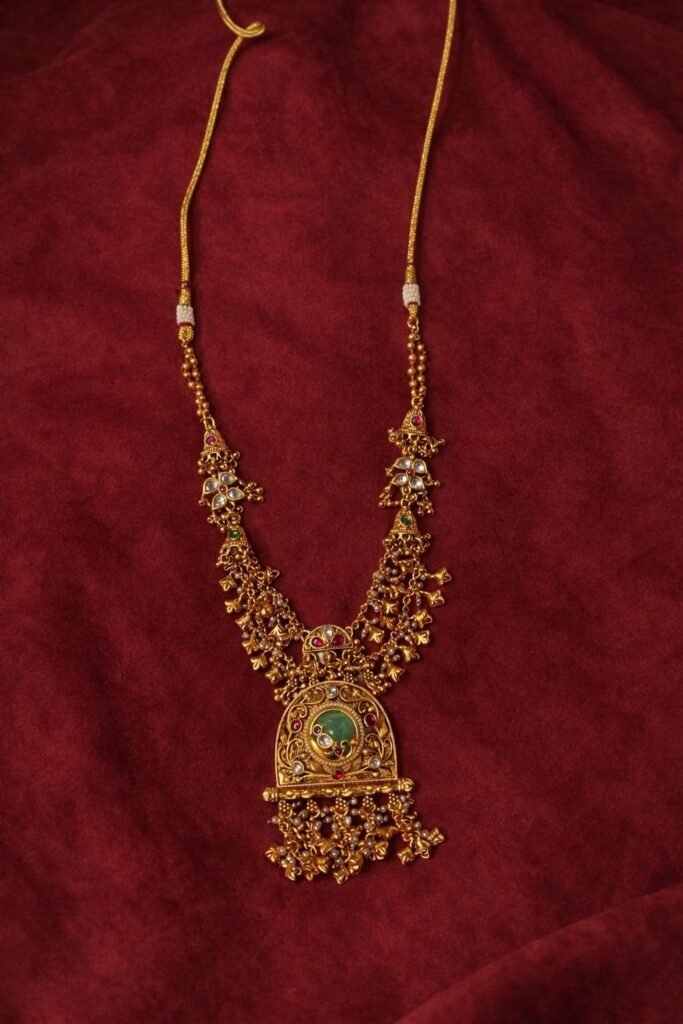 Traditional Gold-Toned Temple Necklace with Green Stone Pendant