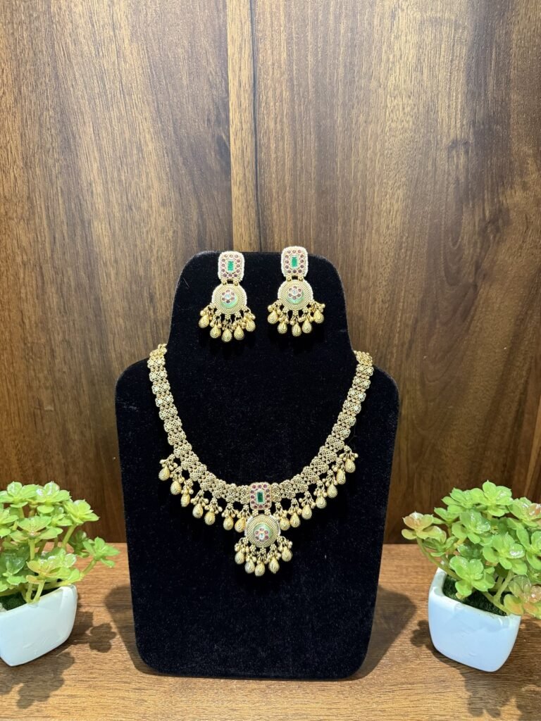 Traditional Gold-Toned Necklace Set with Green and Maroon Stones