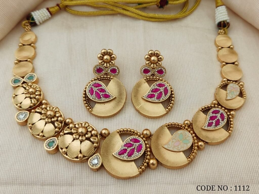 Elegant Gold-Toned Peacock Design Necklace and Earring Set with Pink Meenakari Work