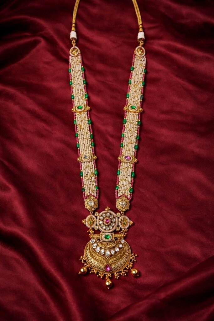 Traditional Gold-Plated Pearl & Emerald Long Necklace Set with Chandbali Pendant