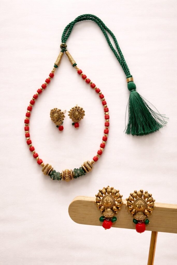Traditional Gold-Toned Temple Jewelry Set with Green Beaded Necklace and Matching Earrings