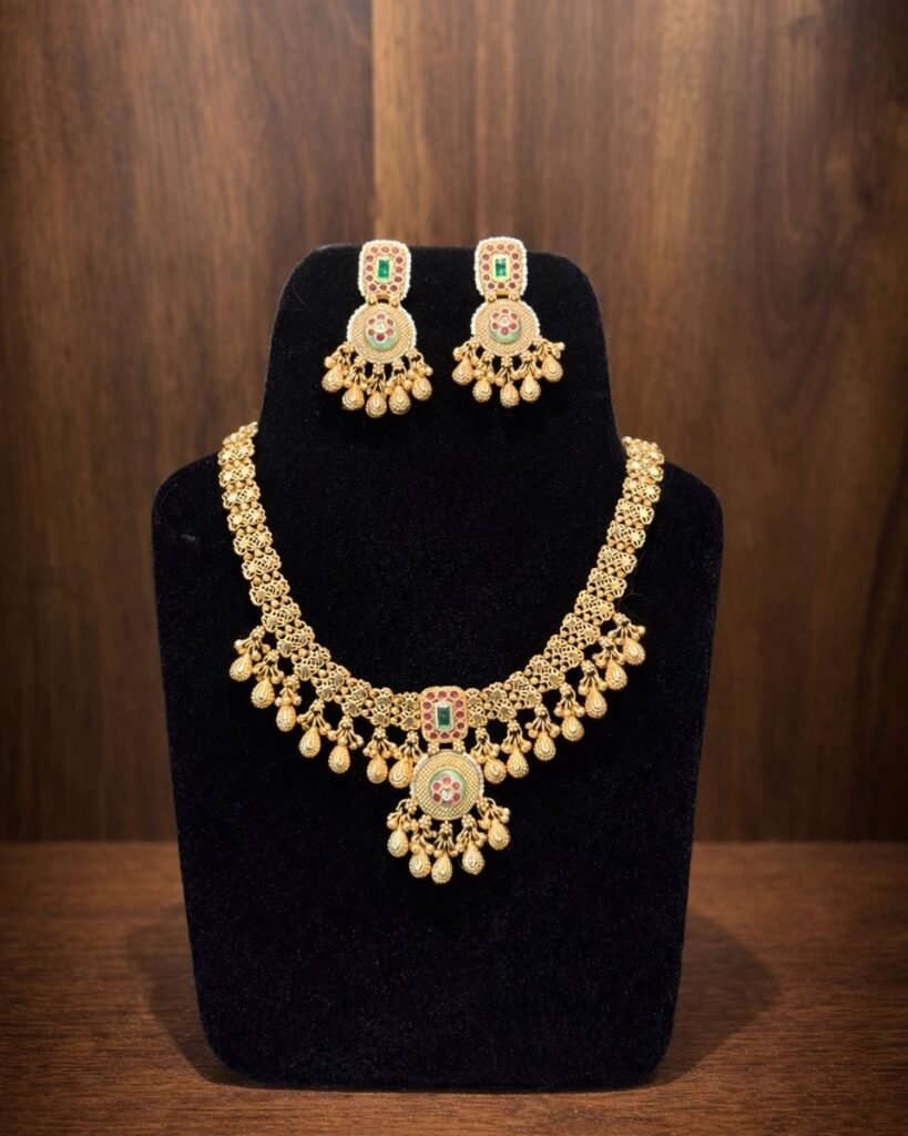 Traditional Gold-Toned Kundan Necklace Set with Green and Pink Accents