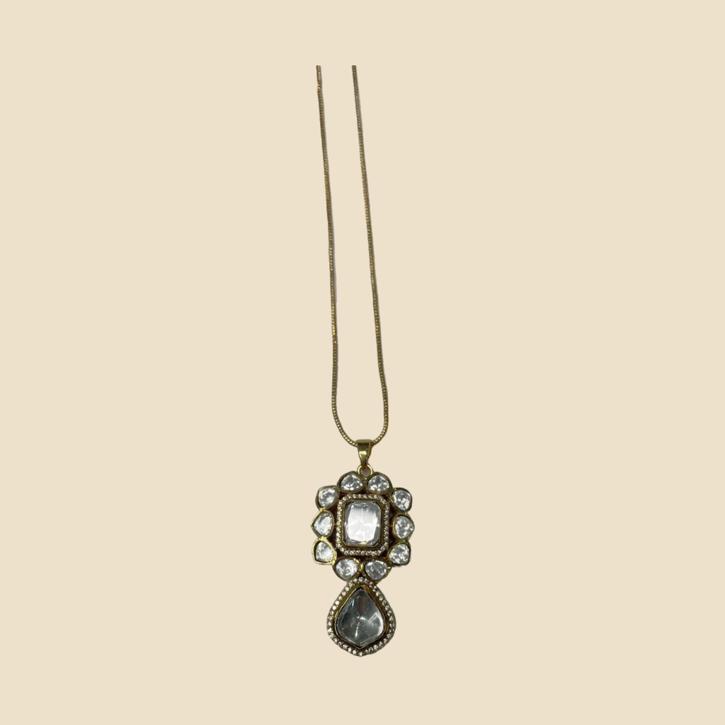Gold-Toned Crystal Studded Pendant Necklace and Earrings Set