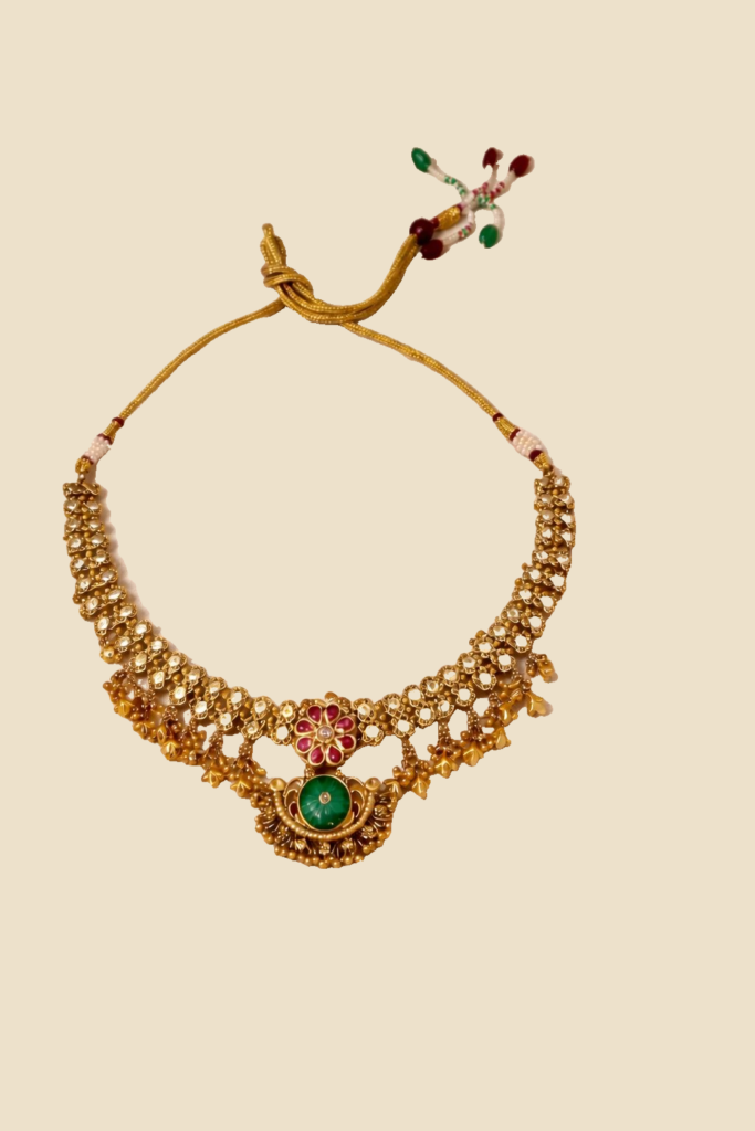 Traditional Gold-Toned Kundan Necklace Set with Green Stone Accents