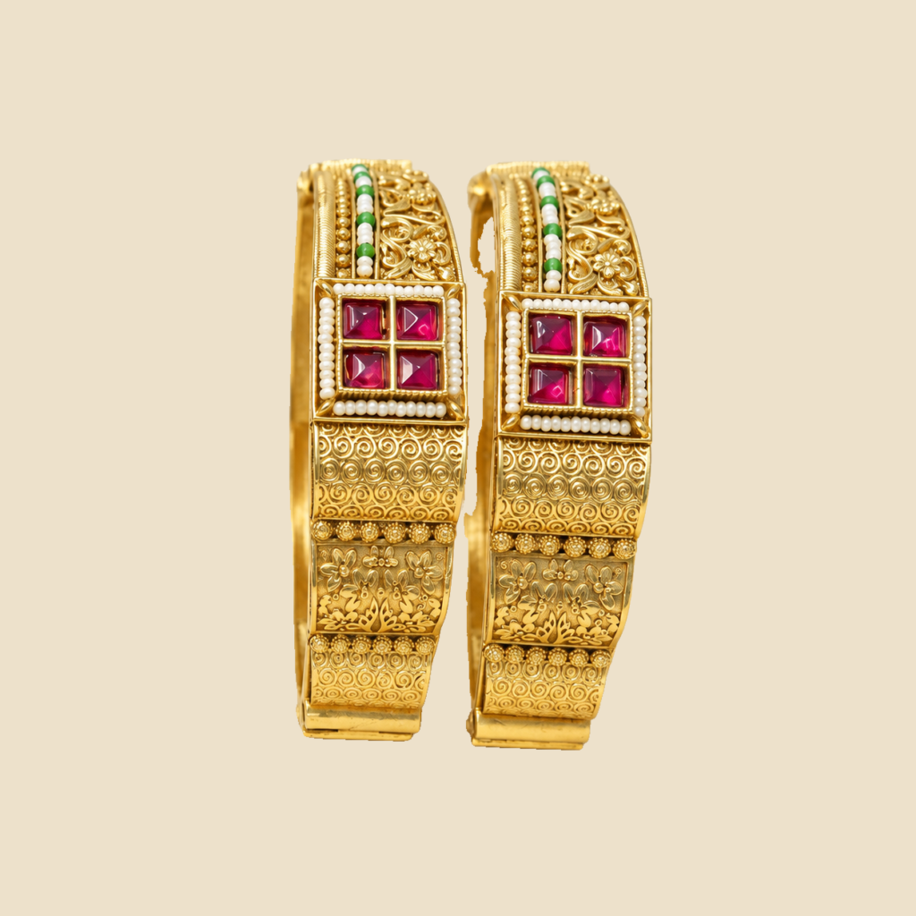 Elegant Gold-Plated Bangles with Pink Stone Embellishments