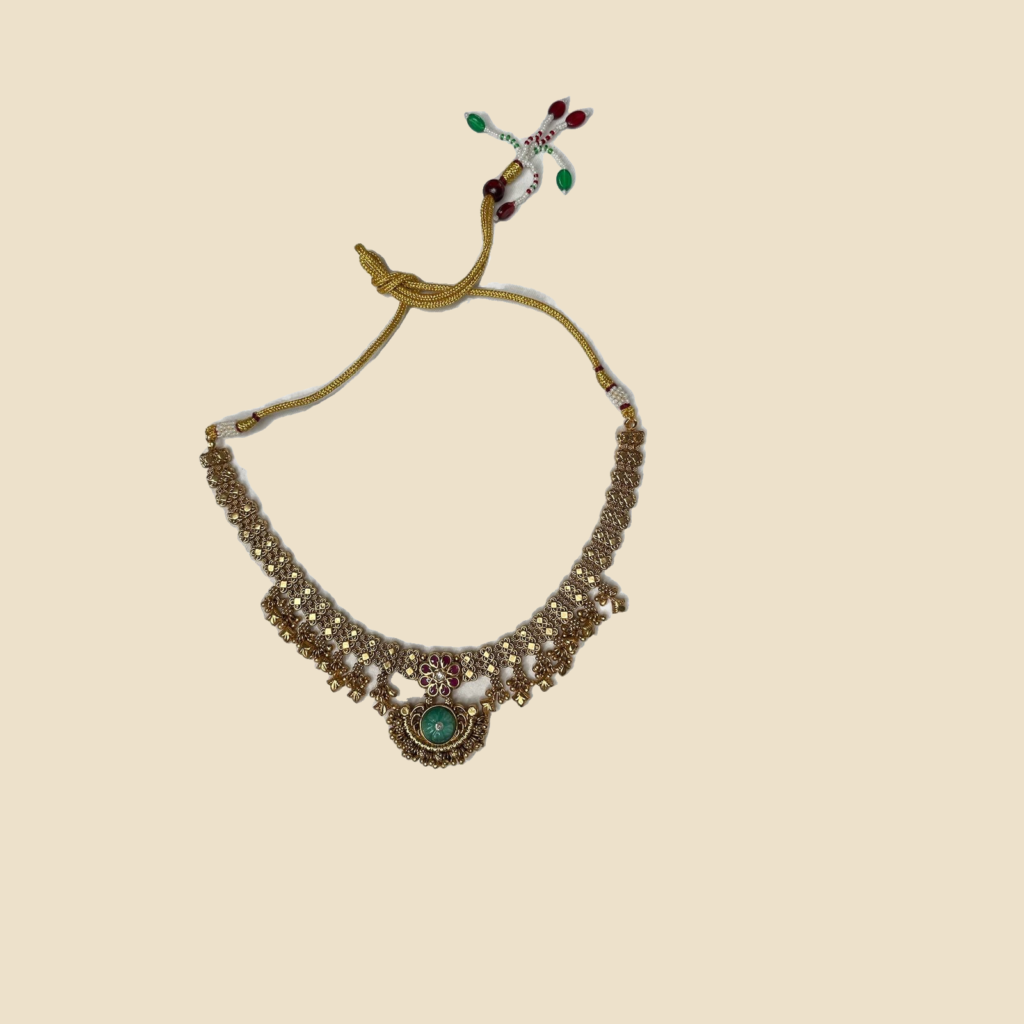 Traditional Gold-Toned Necklace Set with Green and Ruby Accents