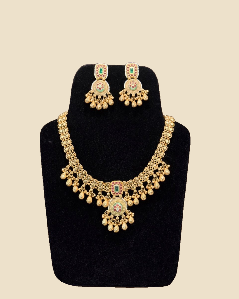 Traditional Gold-Toned Kundan Necklace Set with Green and Pink Accents