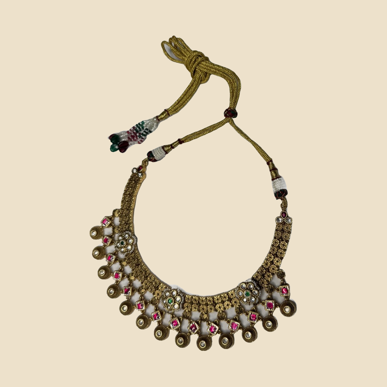 Traditional Gold-Toned Necklace and Jhumka Earrings Set with Pink and Green Accents