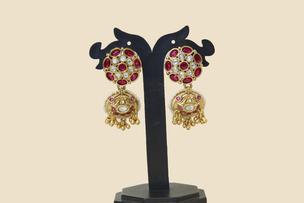 Traditional Gold-Tone Jhumka Earrings with Red Stone Studs