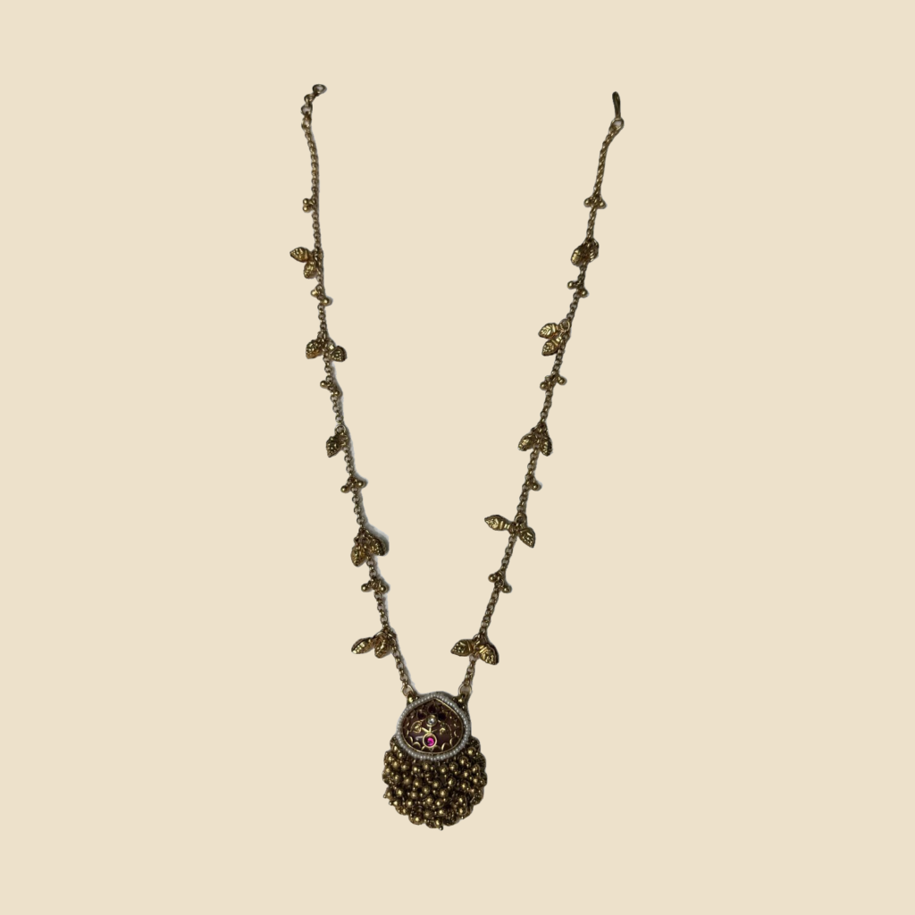 Elegant Gold-Toned Necklace Set with Pink Stone Pendant and Matching Earrings