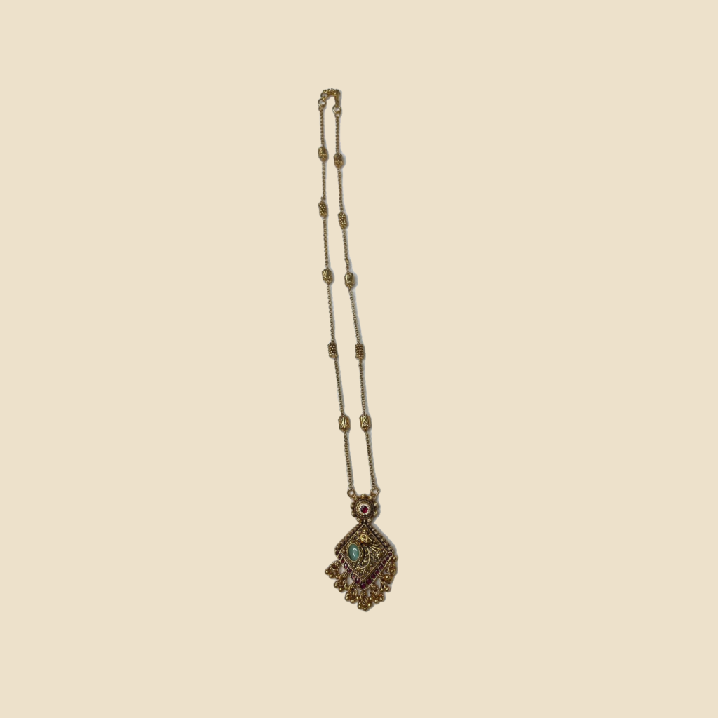 Traditional Gold-Toned Kundan Pendant Necklace Set with Matching Earrings