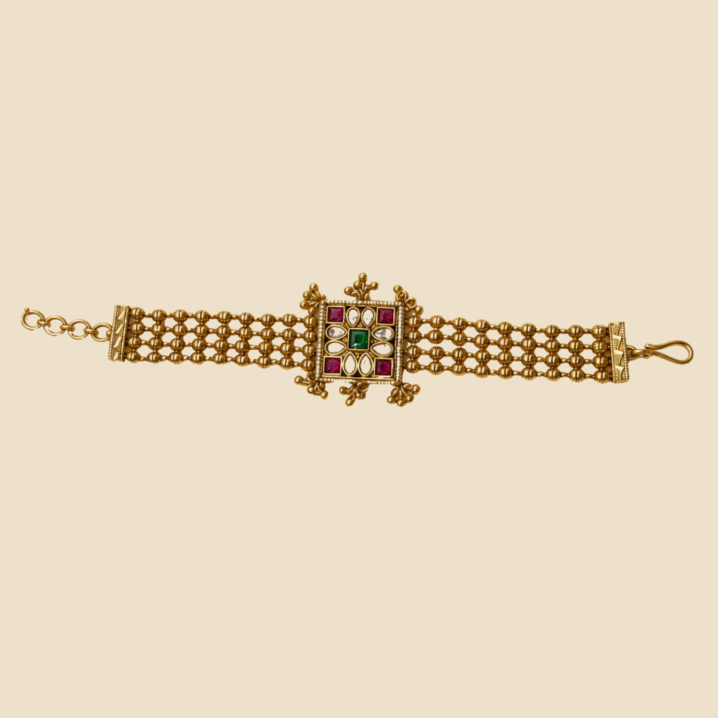Traditional Gold-Plated Pearl Bracelet with Kundan Centerpiece